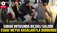 Bıçaklı saldırıya uğrayan kadını, esnaflar meyve kasalarıyla kurtardı