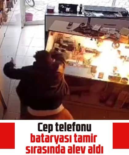 Cep telefonu bataryası tamir sırasında alev aldı